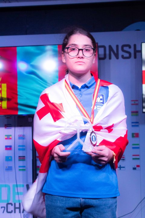 Medallist at the prize-giving ceremony of the FIDE World U7–U17 Championships 2026.